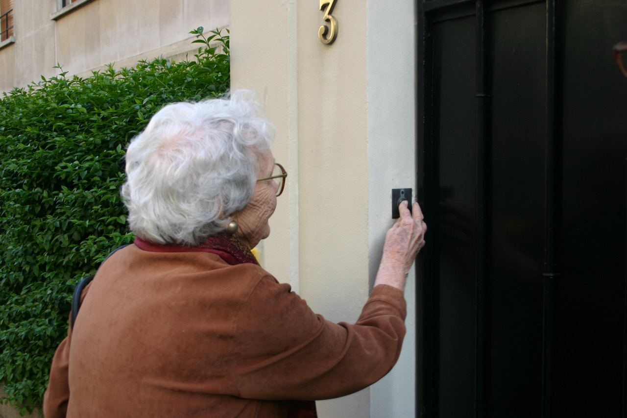 2. Mom Pushing Olivia's doorbell