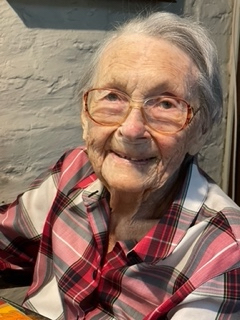 6. Rhoda in her favorite chair in her kitchen